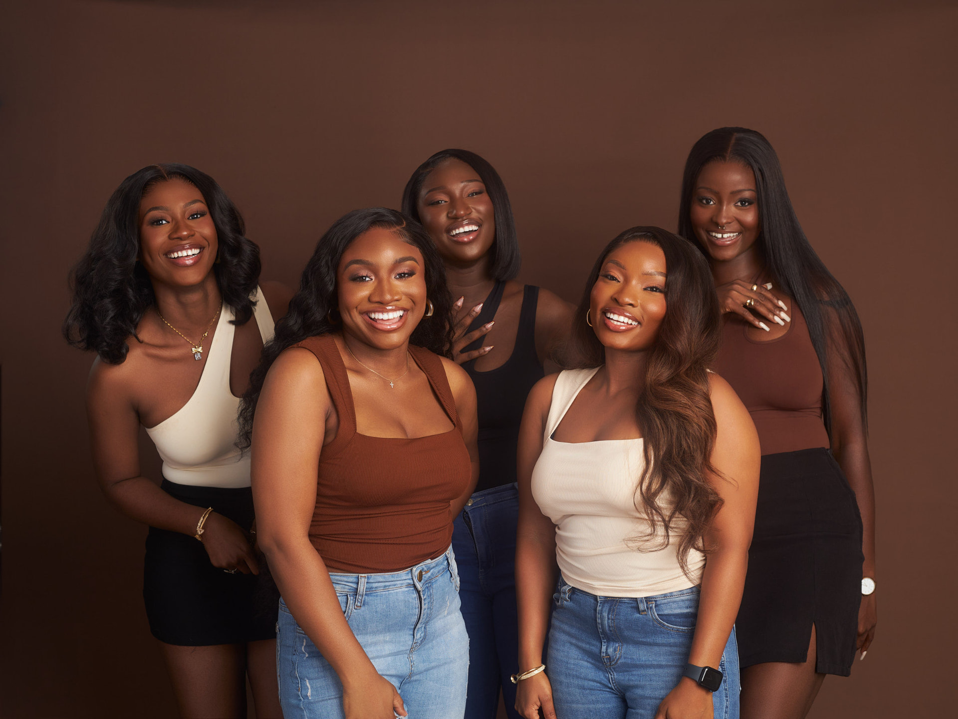 Five women wearing WigHub wigs